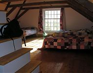 slaapzolder met lappendekens